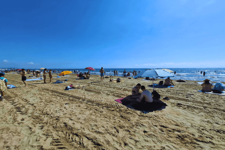 The clear waters and sandy shores of Platja del Cabanyal