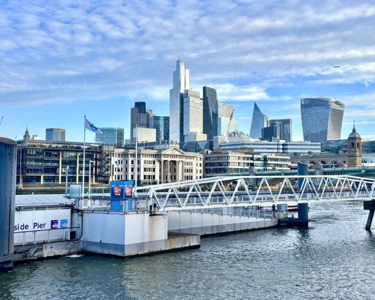 Stunning view of the London skyline featuring modern skyscrapers against a clear sky, showcasing the city's iconic blend of historic and contemporary architecture.
